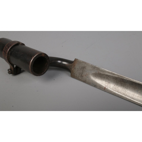 113 - A Victorian Enfield Martini Henry MkIII rifle. Dated 1884. With sling and socket bayonet in scabbard... 