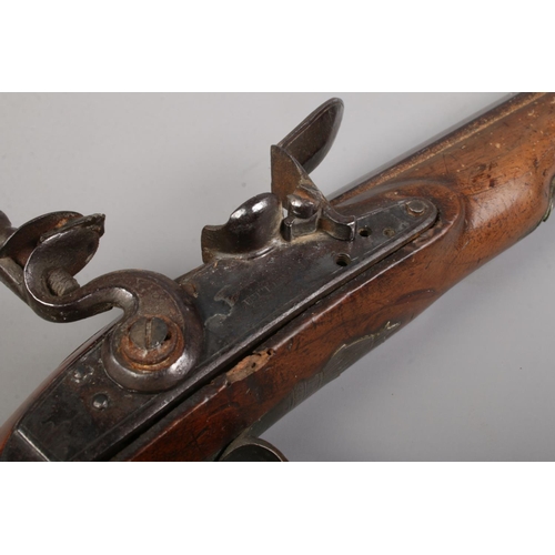 121 - A 19th century flintlock pistol with octagonal barrel. The lock plate stamped for Utting. CANNOT POS... 