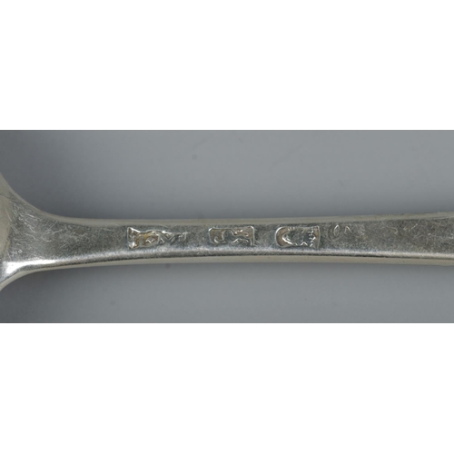 129 - A George III silver berry spoon. Assay marks for London, possibly 1771. 57g.