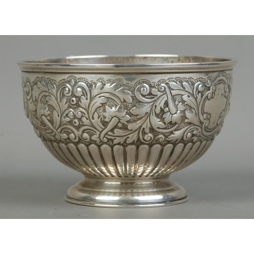 130 - A Victorian silver pedestal bowl with repousse decoration. Assayed London 1893 by John Bodman Carrin... 