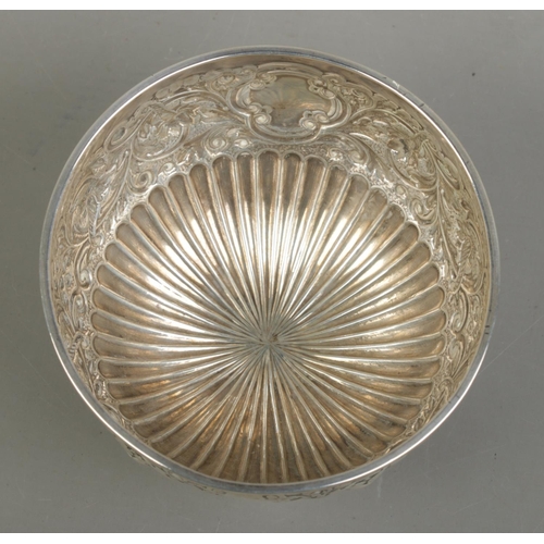 130 - A Victorian silver pedestal bowl with repousse decoration. Assayed London 1893 by John Bodman Carrin... 