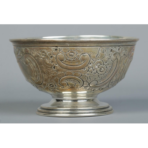 136 - A George V silver pedestal bowl with repousse decoration. Assayed Sheffield 1911 by Walker & Hall. H... 