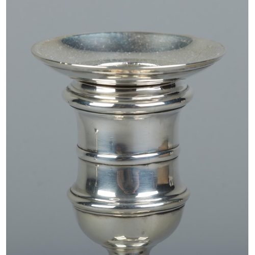 144 - A pair of silver candlesticks with detachable nozzles. Assayed for Sheffield with date marks for 190... 