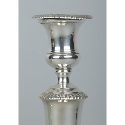 160 - A large pair of George III candlesticks with detachable nozzles. Assayed Sheffield 1809 by John Robe... 