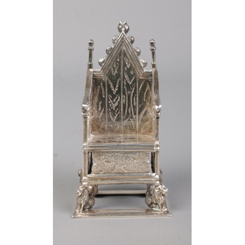 170 - A miniature silver model of The Coronation Chair. Assayed Birmingham 1910 by Adie & Lovekin Ltd. 14.... 