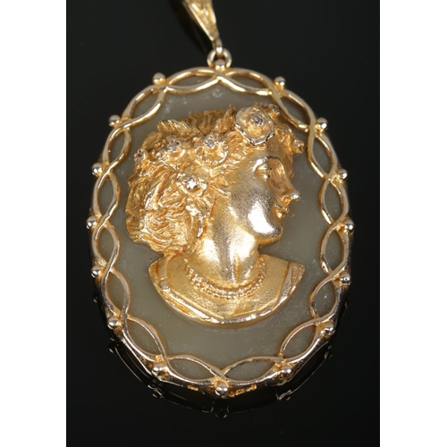 180 - A 9ct gold, agate and diamond pendant, portrait of a maiden in high relief. Assay marks for London 1... 