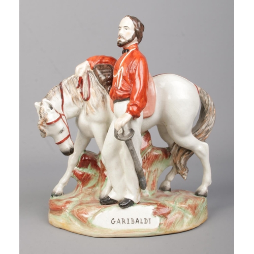 19 - A 19th century Staffordshire figure, Giuseppe Garibaldi and horse, by Thomas Parr. Height 23cm.