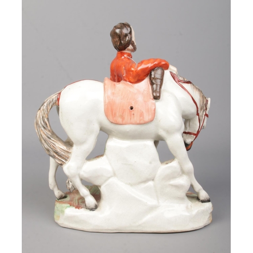 19 - A 19th century Staffordshire figure, Giuseppe Garibaldi and horse, by Thomas Parr. Height 23cm.