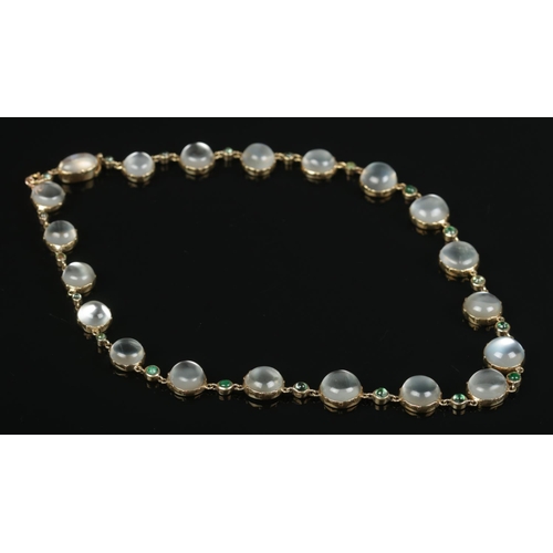 196 - A 9ct gold moonstone and emerald coloured necklace, set with alternating cabochon stones. Approximat... 