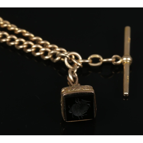 198 - A 9ct gold Albert chain with seal fob and T-bar. Approximate length 45cm. 46.2g (without fob).