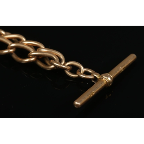 199 - A 18ct gold Albert chain and T-bar. Length approximately 36cm. 49.43g.