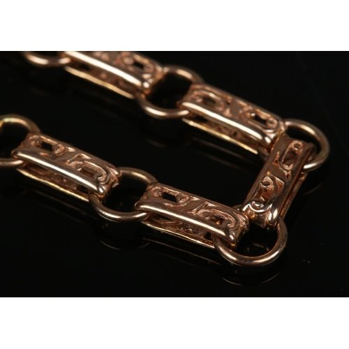 209 - A 9ct rose gold fancy link necklace. Approximate length 45cm. 26.7g.