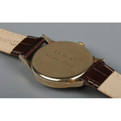 215 - A gents 9ct gold Longines manual wristwatch. Having subsidiary seconds and baton and Arabic numeral ... 