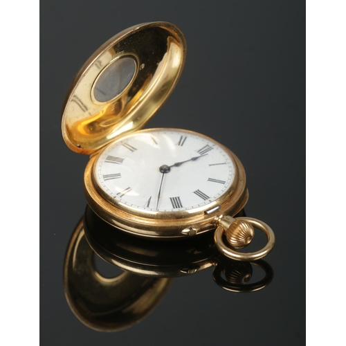 221 - An 18ct gold demi hunter fob watch. Engraved with monogram to back of case. 53.11g gross weight.