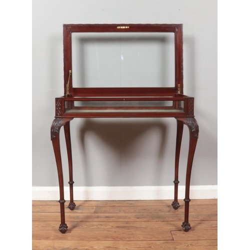 255 - An early 20th century Chippendale style bijouterie cabinet. Height 78cm, Width 77cm, Depth 46.5cm.