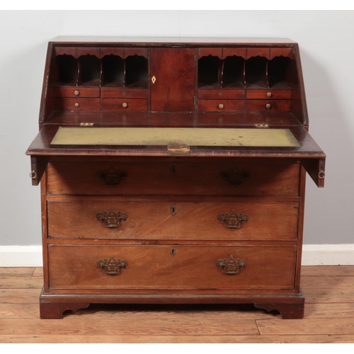 267 - A Georgian mahogany bureau with fitted interior.