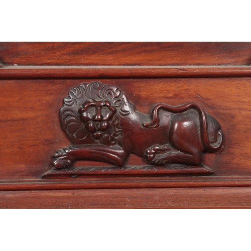 269 - A Georgian mahogany longcase clock. Having twin swan neck pediments, carved lion detail and satinwoo... 