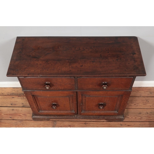 276 - A Georgian oak sideboard, having two drawers and cupboard base.