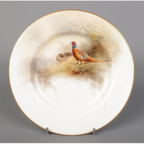 30 - James Stinton for Royal Worcester, a porcelain plate with hand painted scene depicting pheasants in ... 