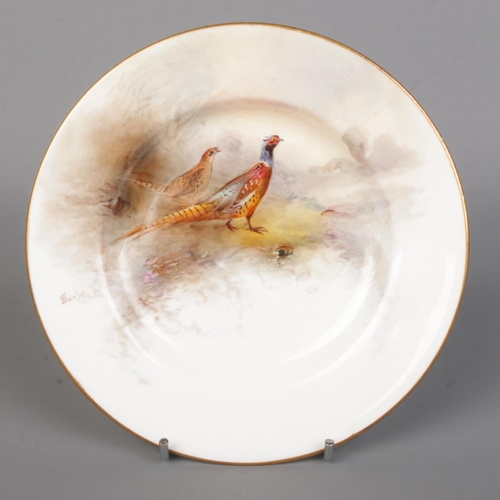 31 - James Stinton for Royal Worcester, a porcelain plate with hand painted scene depicting male and fema... 