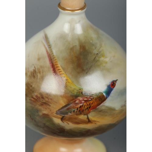 36 - James Stinton for Royal Worcester, a porcelain vase with hand painted scene depicting pheasant in wo... 