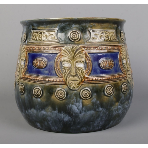 44 - An early 20th century Royal Doulton Maori Ware glazed stoneware jardiniere. Decorated with mask and ... 