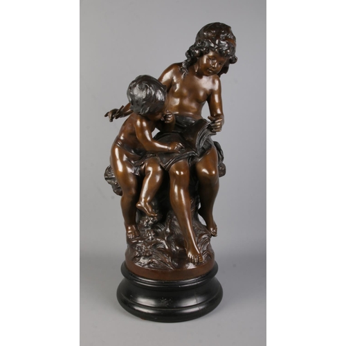 53 - After Auguste Moreau, a large bronze sculpture, La Grande Soeur (The Big Sister), modelled as childr... 