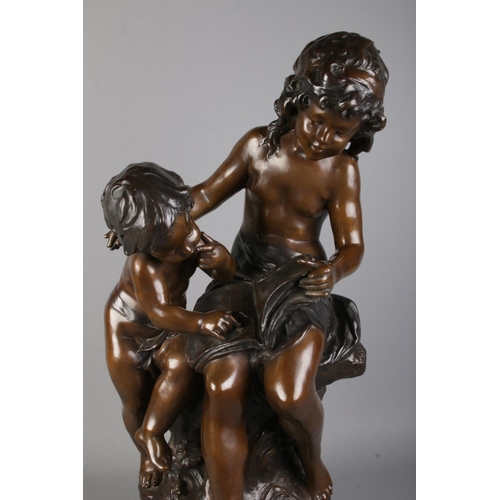 53 - After Auguste Moreau, a large bronze sculpture, La Grande Soeur (The Big Sister), modelled as childr... 