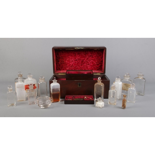 62 - An early 19th century mahogany apothecary box with contents of glass medicine and poison bottles. 16... 