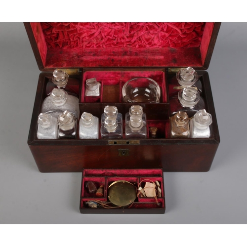 62 - An early 19th century mahogany apothecary box with contents of glass medicine and poison bottles. 16... 