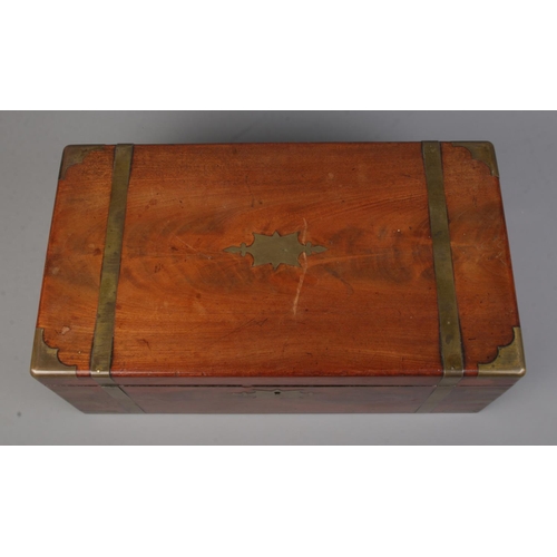 65 - A Victorian brass bound mahogany writing box.