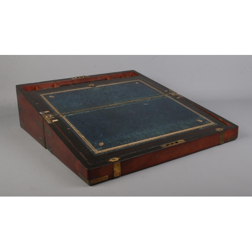 65 - A Victorian brass bound mahogany writing box.