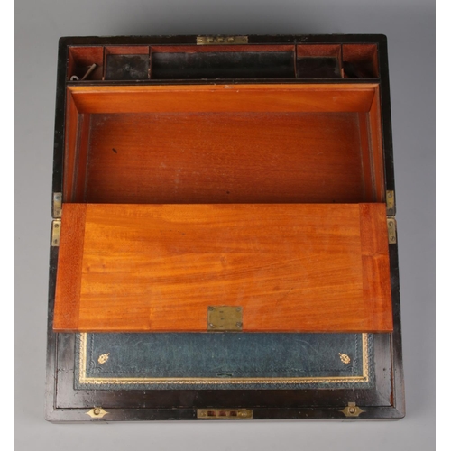 65 - A Victorian brass bound mahogany writing box.