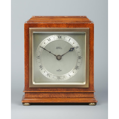 70 - A vintage oak cased Elliott mantel clock. Retailed by Burrell, Sheffield. Height 16cm.