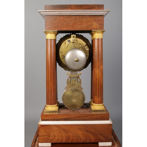 72 - A 19th century French inlaid rosewood Portico clock. Height on stand 47.5cm.