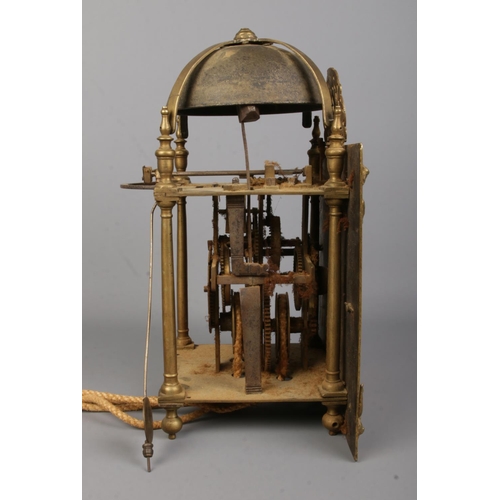 74 - An early 19th century brass lantern clock by Joshua Allsopp, East Smithfield. Height 33cm.