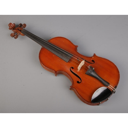 79 - An antique 14inch violin with two piece back. Label inside F hole 'Model Antonius Stradivarius Cremo... 