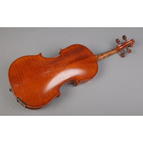 79 - An antique 14inch violin with two piece back. Label inside F hole 'Model Antonius Stradivarius Cremo... 