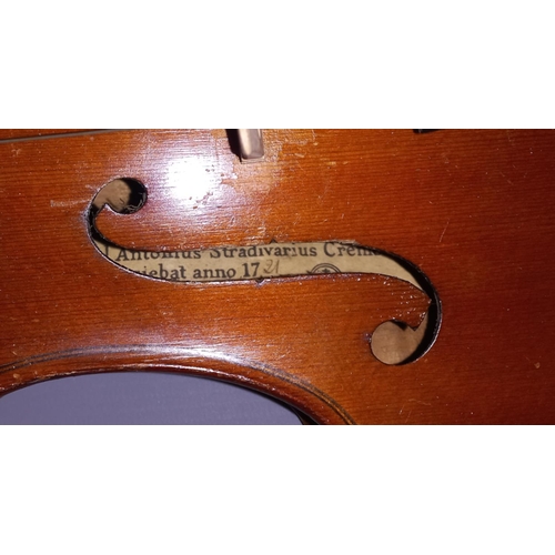 79 - An antique 14inch violin with two piece back. Label inside F hole 'Model Antonius Stradivarius Cremo... 