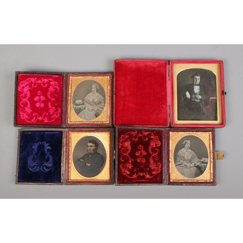 90 - A collection of cased antique photographs. Includes a daguerreotype of a gentleman and three ambroty... 