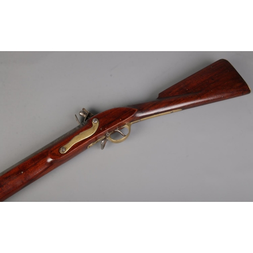 93 - A 19th century flint lock Brown Bess musket. Stamped Tower to lock plate and stock, along with crown... 