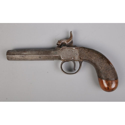 94 - A 19th century percussion cap pistol with octagonal screw off barrel. Length 18cm. CANNOT POST OVERS... 