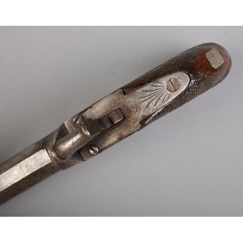 94 - A 19th century percussion cap pistol with octagonal screw off barrel. Length 18cm. CANNOT POST OVERS... 