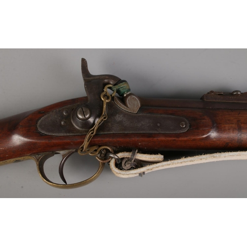 98 - A 19th century Enfield pattern three band muzzle loading percussion rifle. The lock plate stamped fo... 