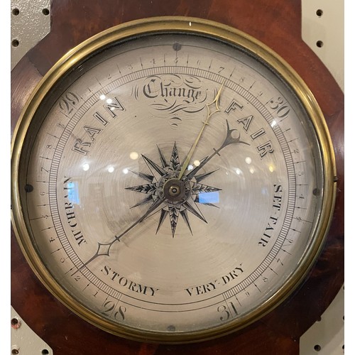 238 - A 19th century mahogany Tagliabue barometer. Bearing later presentation plaque dated 1945.