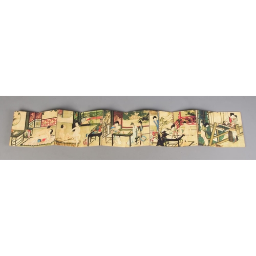 282 - A Japanese Shunga fold out book with central panel depicting couple playing Go and flanked by erotic... 