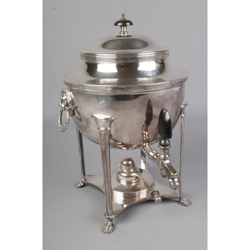 361 - An early 20th century silver plated samovar with lionhead handles and lion paw feet.