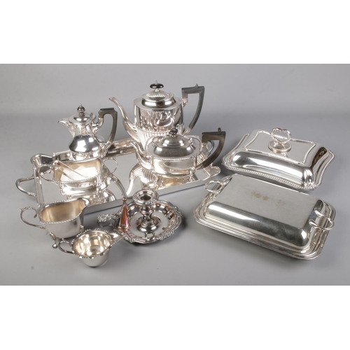 362 - A good collection of silver plate including several tea pots, jugs, tureens, tray, candle holder & s... 