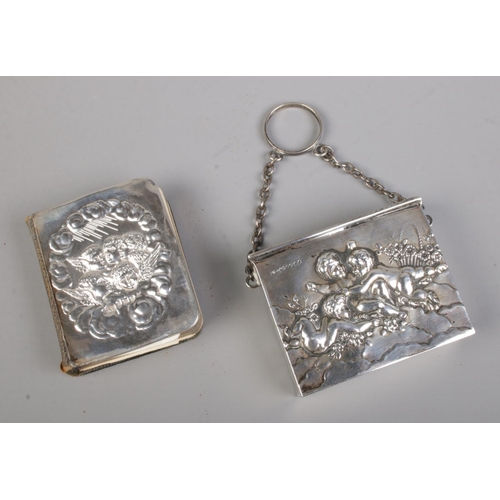 482 - A Victorian silver cased book of common prayer with embossed cherub/putti to case and cover. Assayed... 