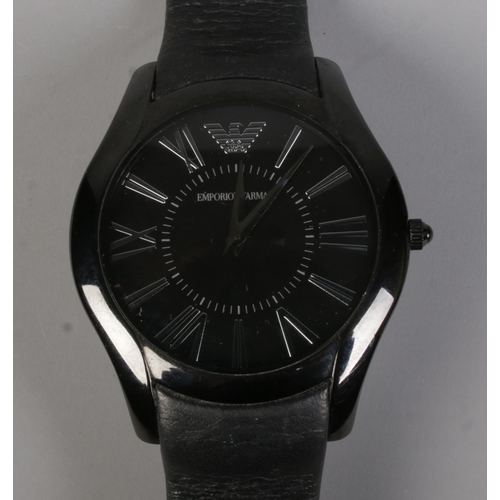 486 - A men's Emporio Armani quartz wristwatch on leather strap.